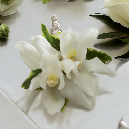 White Mini Cymbidium Boutonniere –  The Flower Gallery, Linden NJ